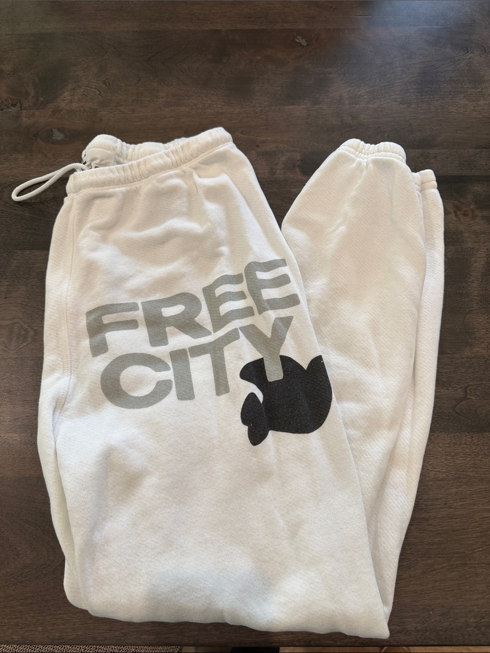 freecity White Joggers with Gray Logo and Black Graphic